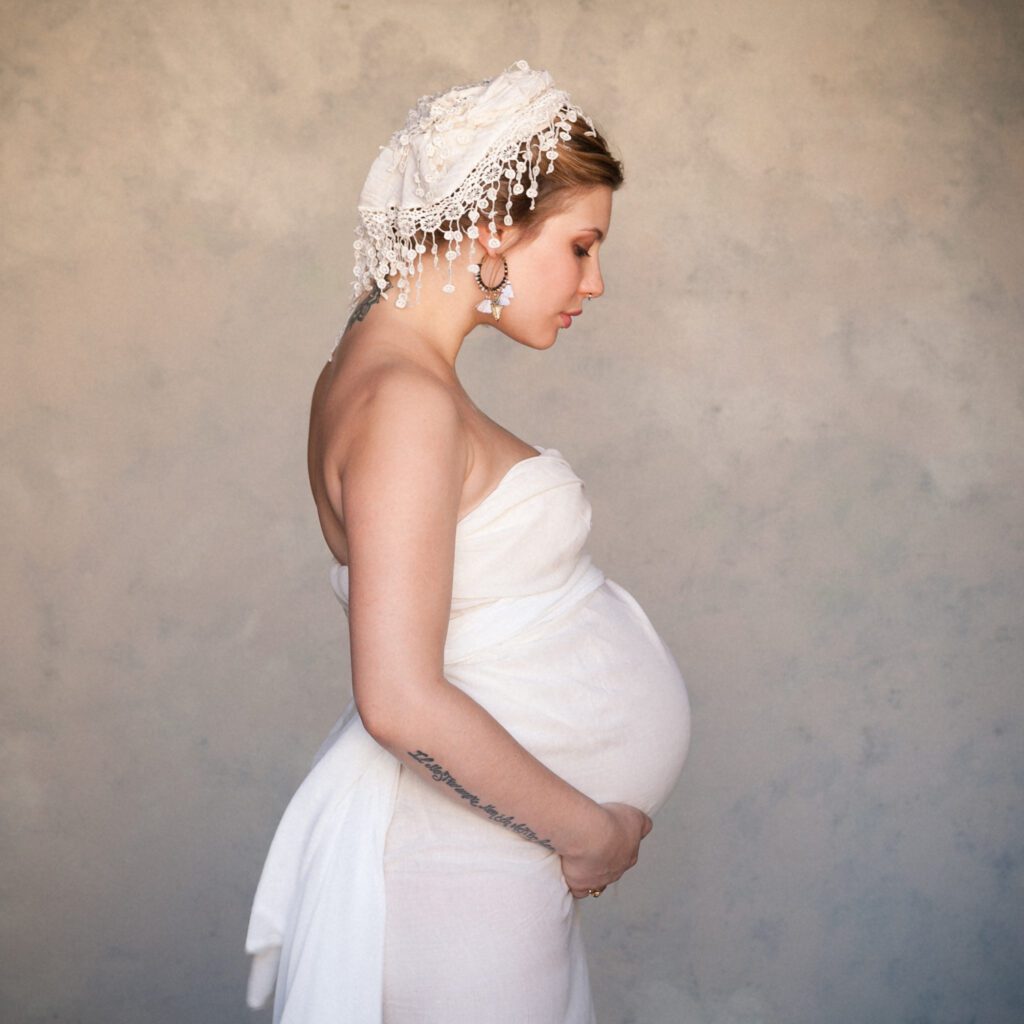 Maternity portrait Andie Nitro 9 months pregnant.