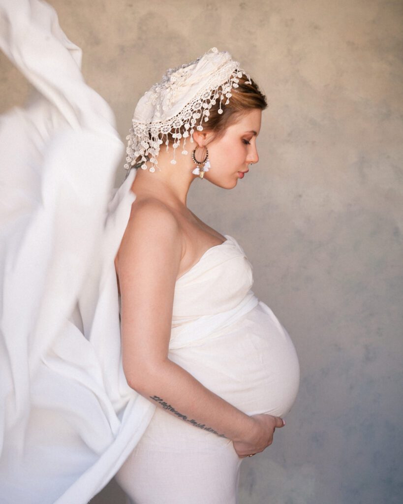Maternity portrait Andie Nitro 9 months pregnant.