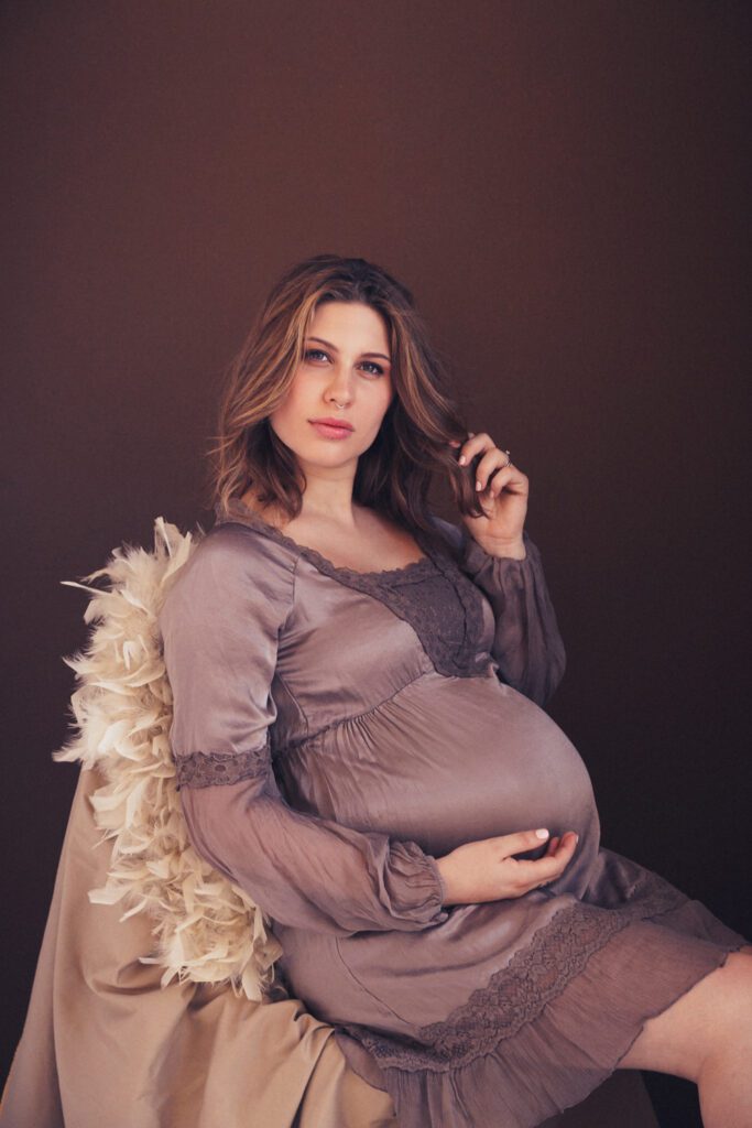 Maternity portrait Andie Nitro 9 months pregnant.